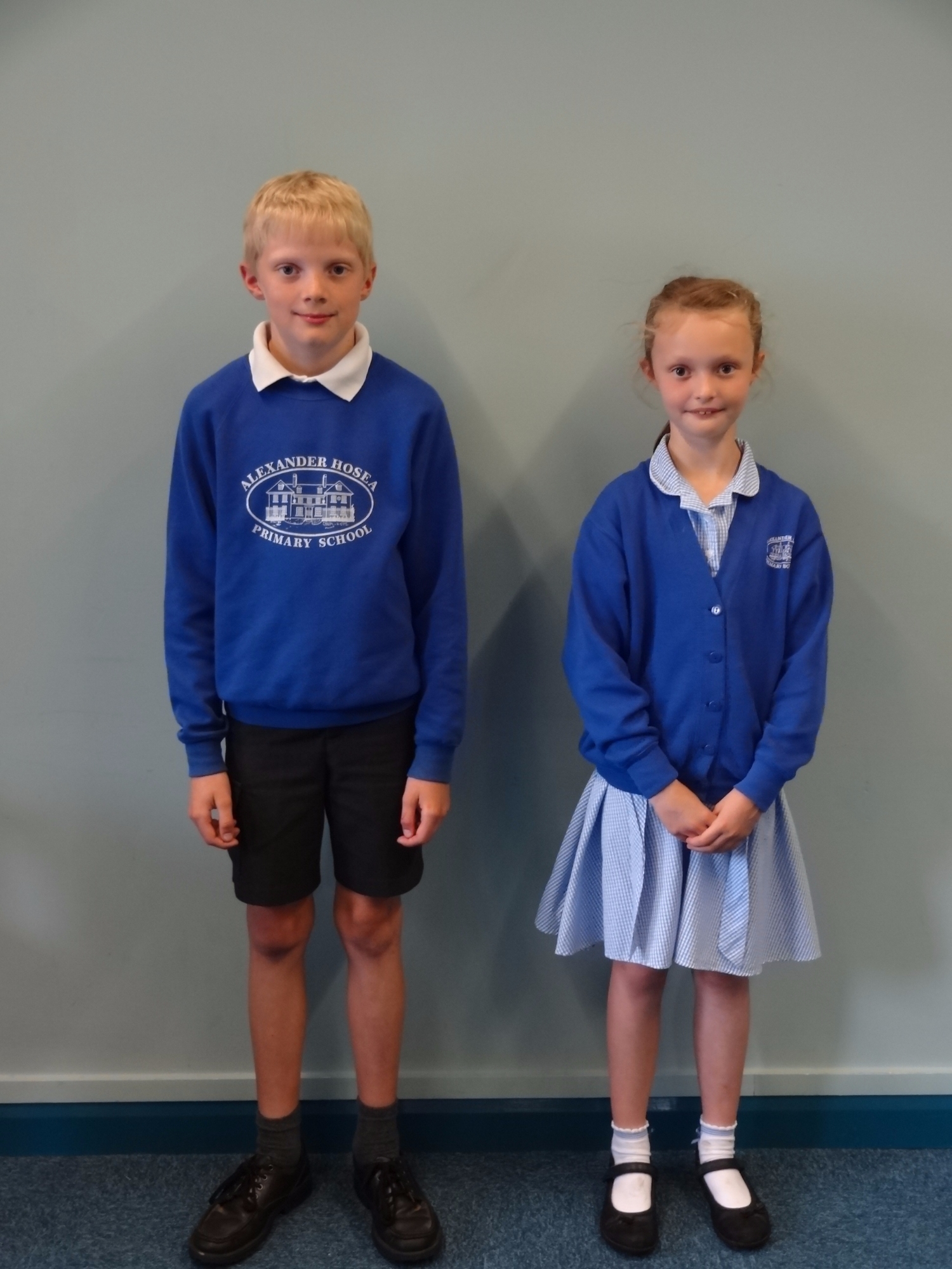 Children modelling school uniform