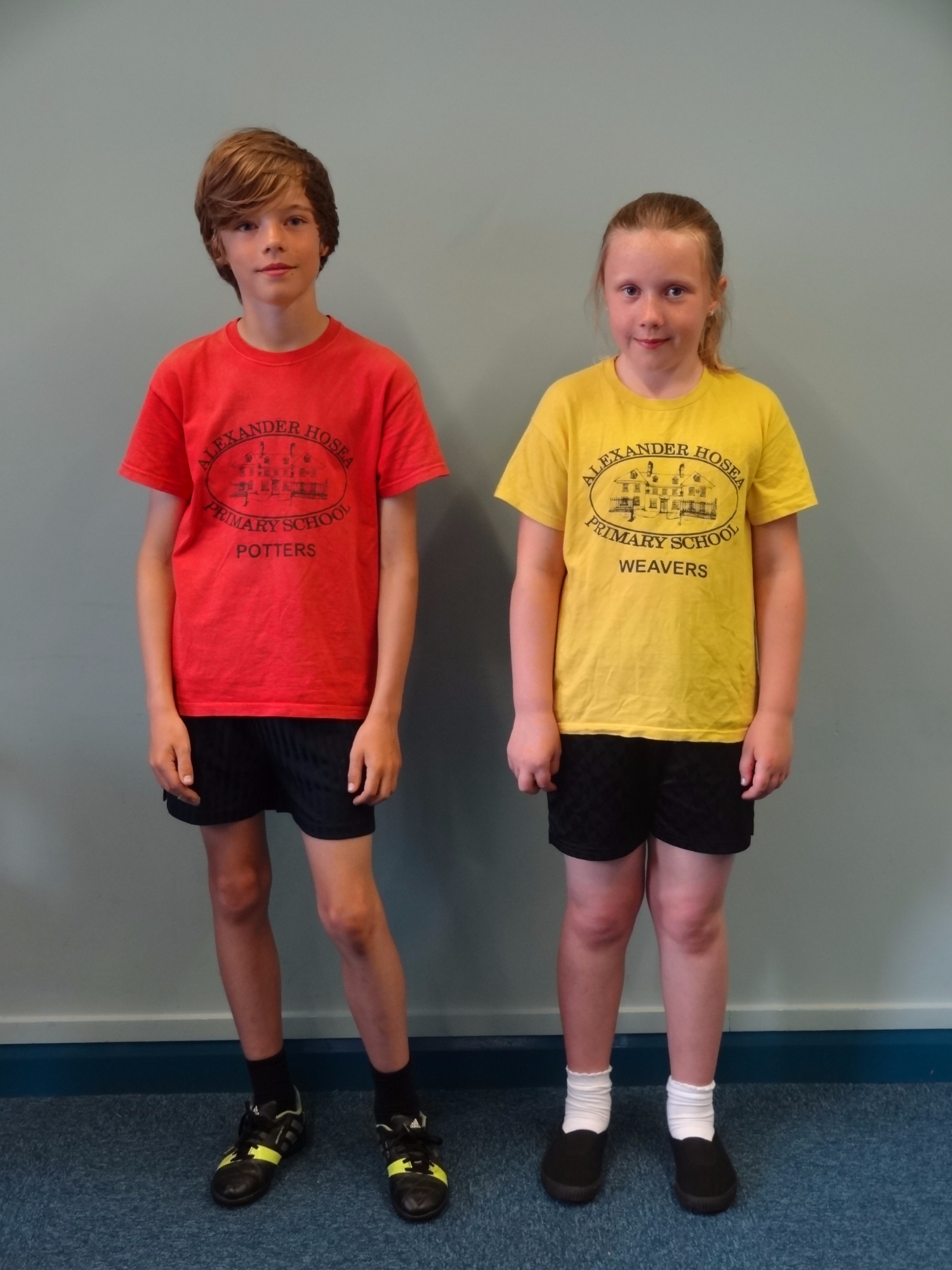 Children modelling school uniform