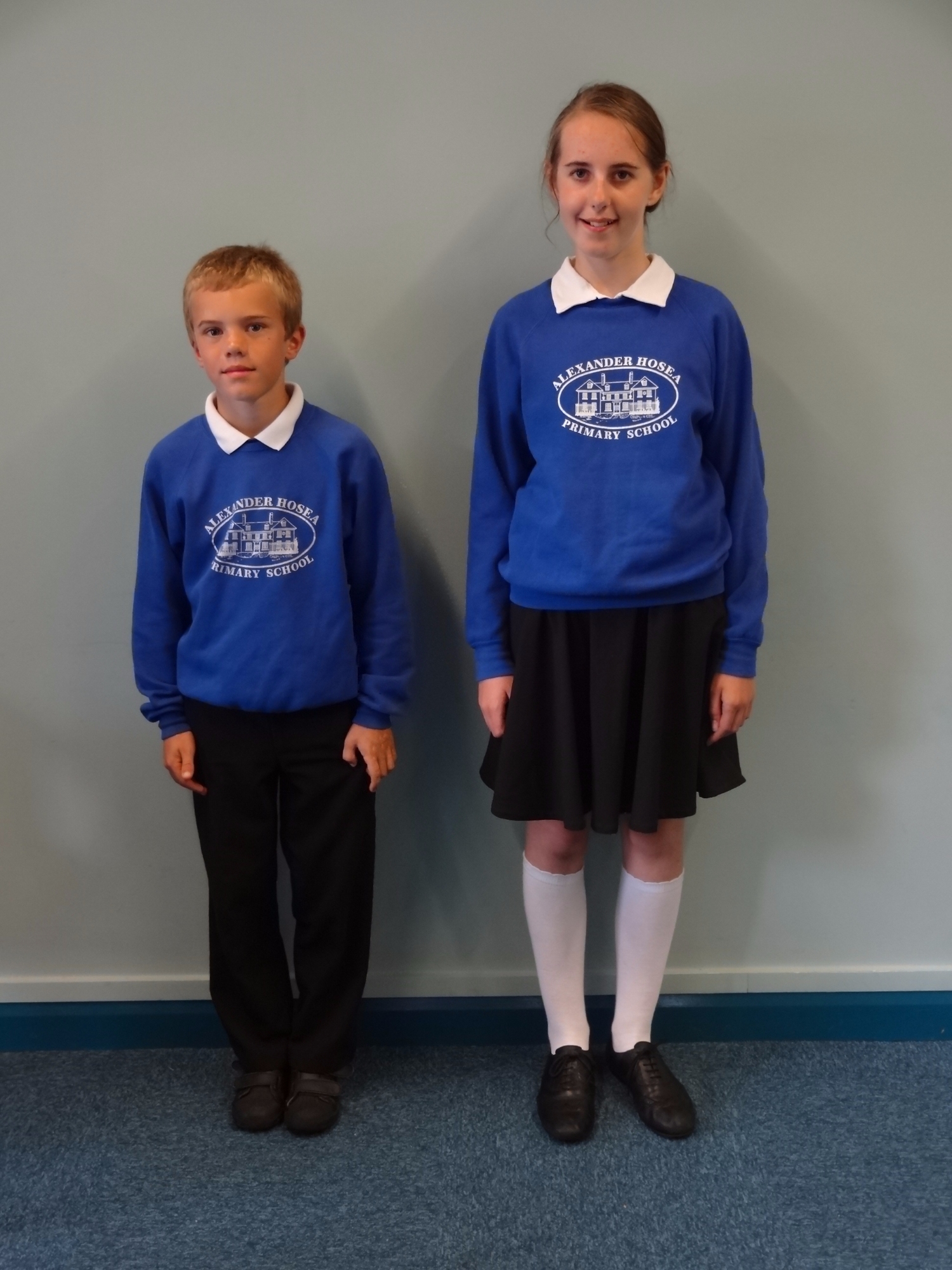 Children modelling school uniform